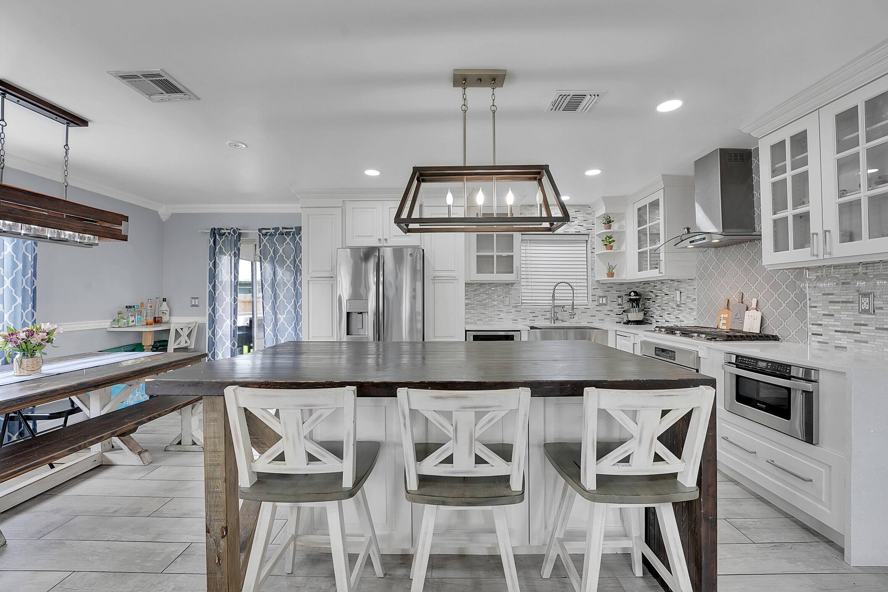 Welcome to this beautifully remodeled and upgraded 3 bedroom, 2 bathroom single story home located in the desirable Knotty Pine Acres community of West Palm Beach.