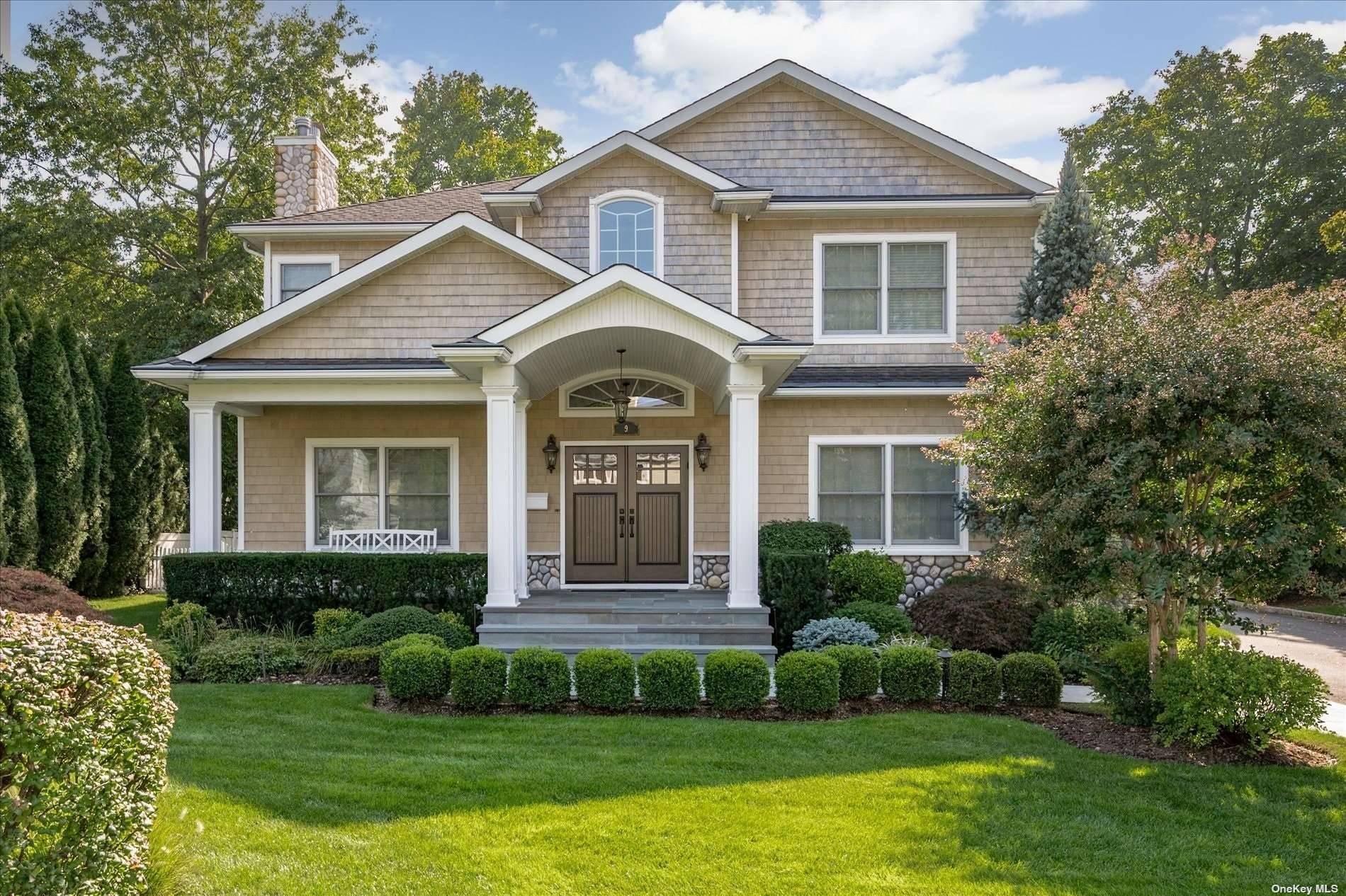 Welcome to this beautiful, young center hall colonial located on a sought after block in the Village of East Hills.