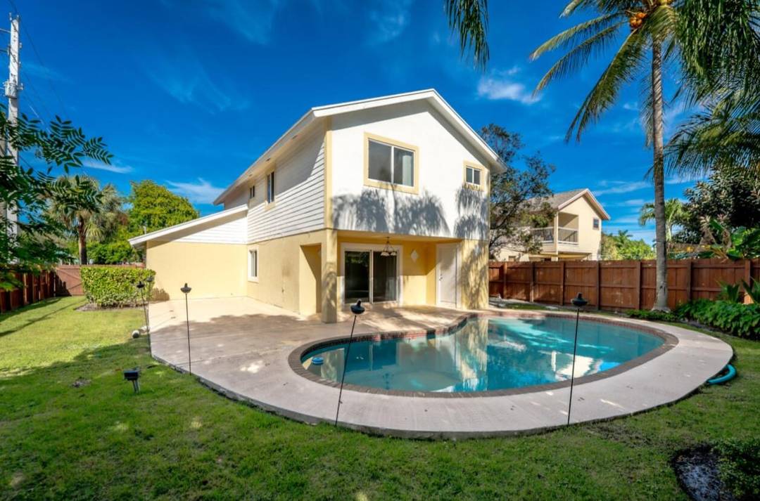 Beautifully renovated 4 bedroom, 2 bath home offering 1, 902 sq ft of living space in highly desirable East Boca Raton.