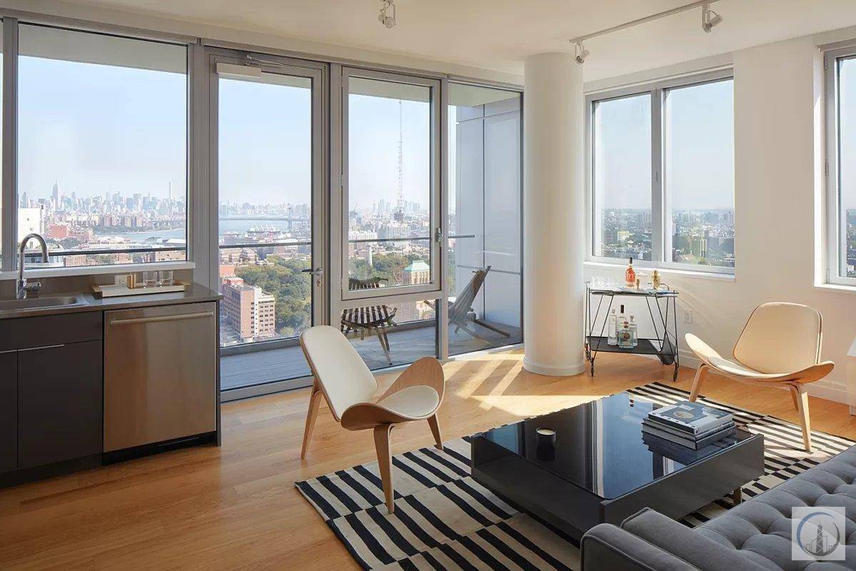 Discover a spacious, rent stabilized 1BR 1BA corner unit with a private balcony adorned with floor to ceiling windows, unveiling breathtaking vistas of both Brooklyn and Manhattan skylines.