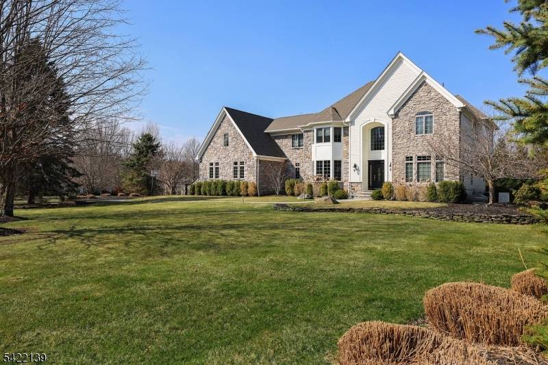 Welcome to this exceptional residence nestled on a breathtaking, park like property that offers both privacy and serenity.