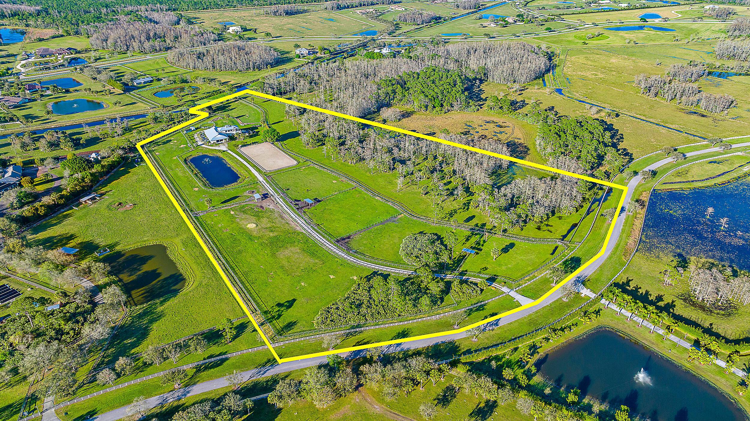 This 21 acre parcel is a prime piece of land with modern equestrian guest amenities, all curated in 2019.