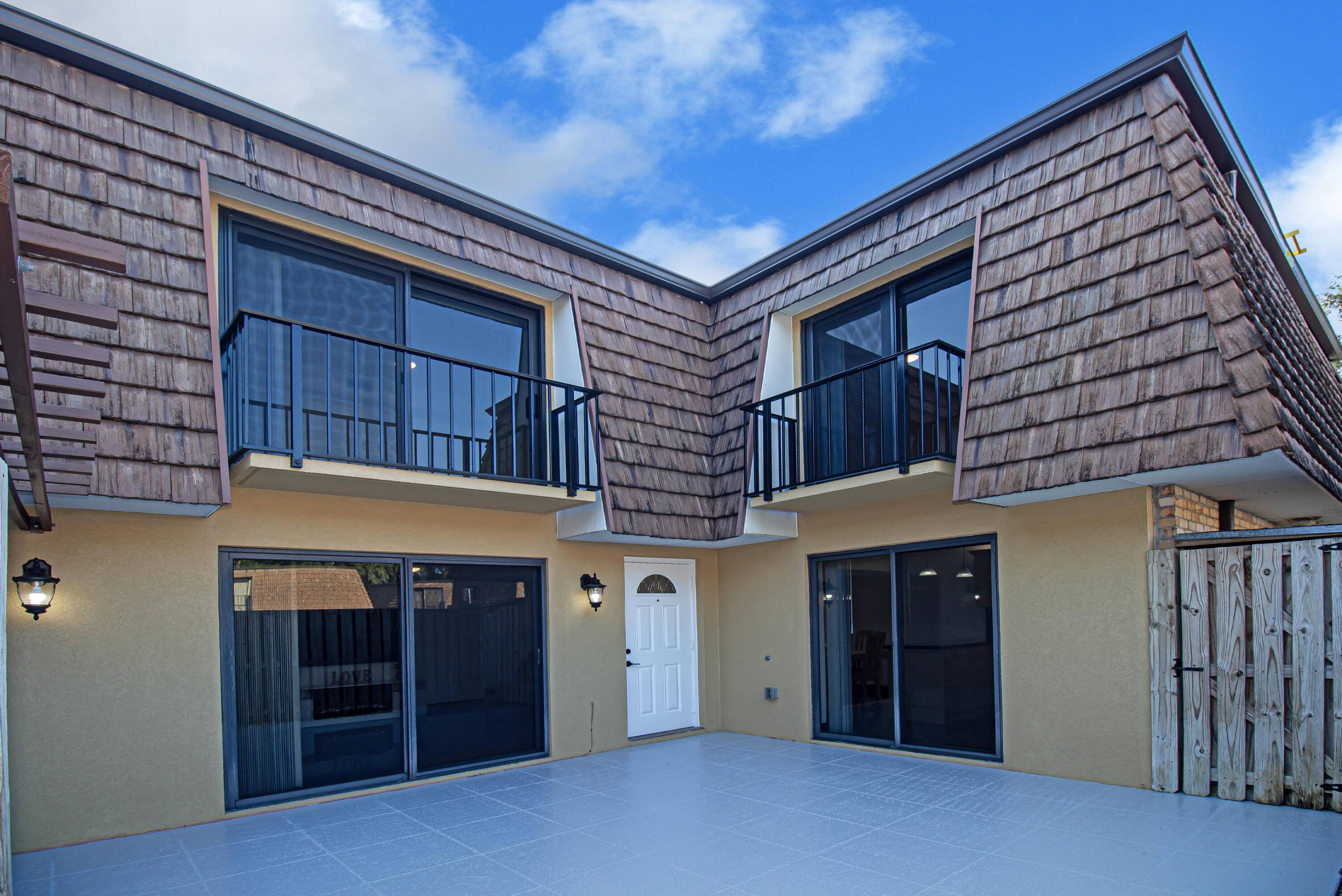 Gorgeous T. House. IMPACT SLIDING DOORS 1ST 2ND FLOOR.