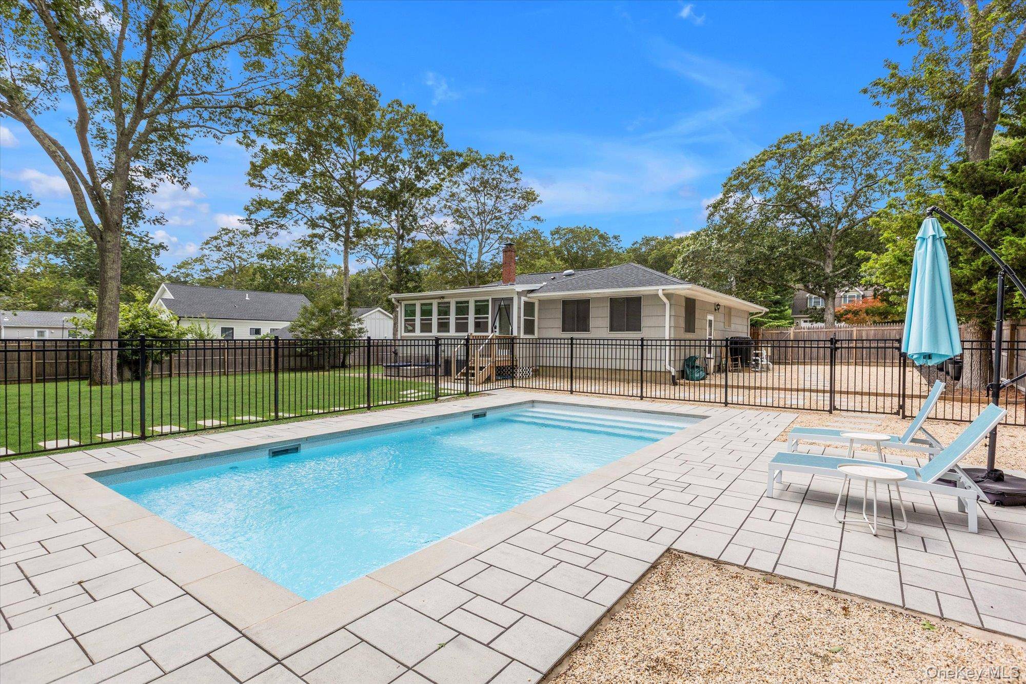 Escape to Mattituck ! This beautiful home is North Fork getaway personified !