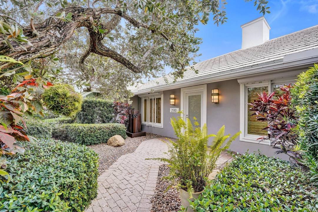 Inspired Coral Ridge Country Club fully renovated home showcasing luxury upgrades and calming designer finishes throughout.