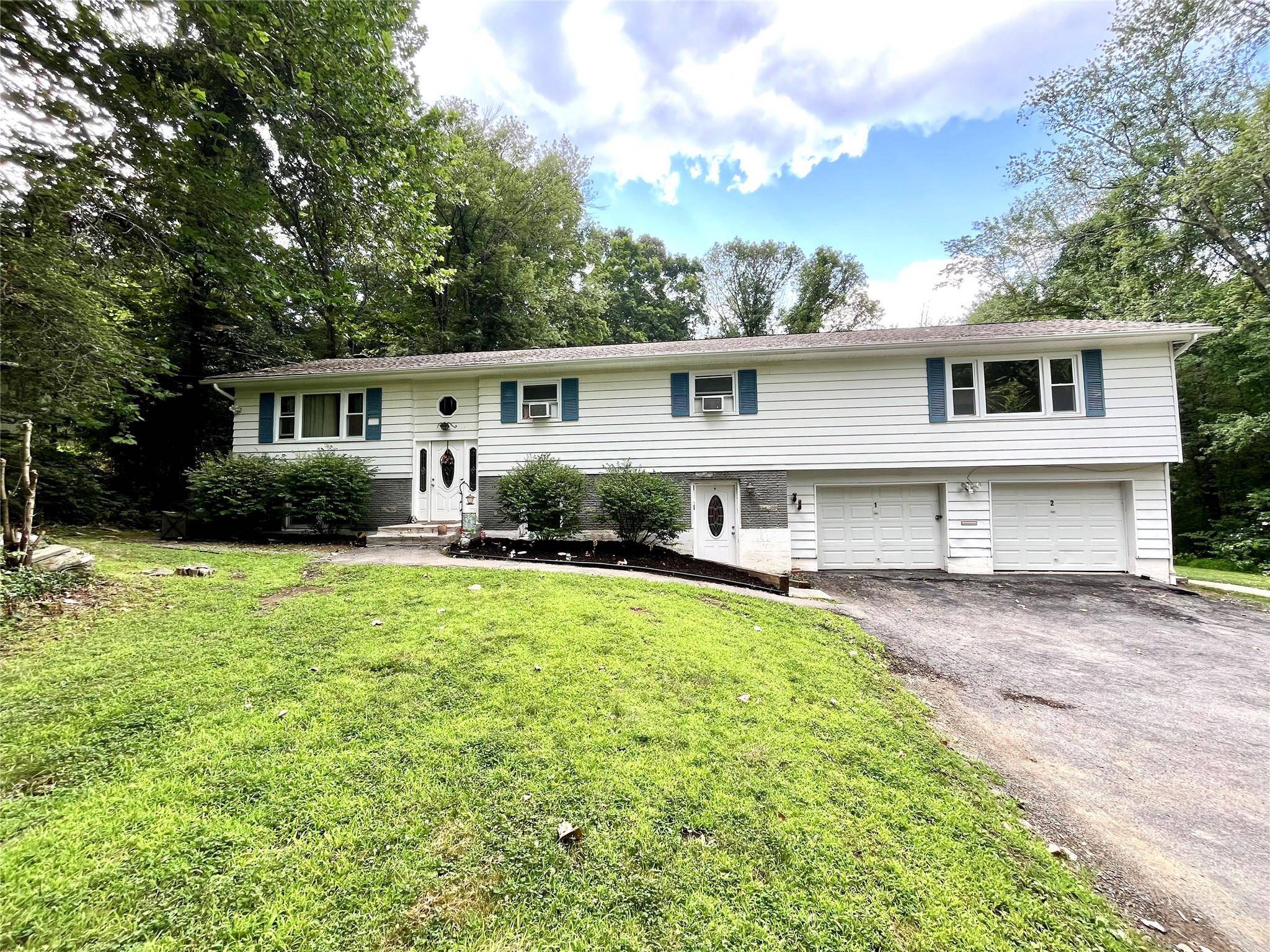 Welcome to this spacious and versatile detached multi family home nestled in the charming town of Hyde Park, just minutes from the world renowned Culinary Institute of America, Marist University, ...