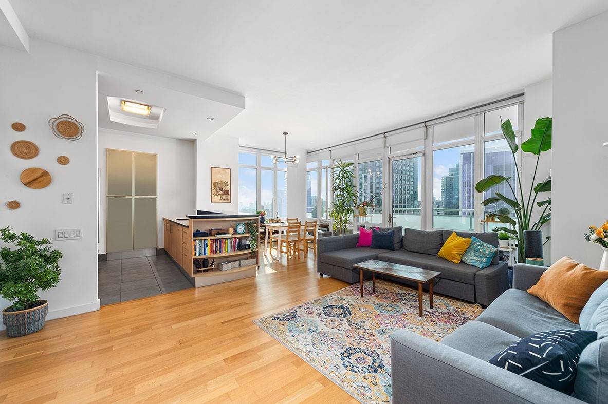 An elegant and sophisticated corner unit 34F is a 1, 221 sq ft, 2 bedroom 2 bath condominium that features floor to ceiling windows, 10 foot high ceilings, a large ...
