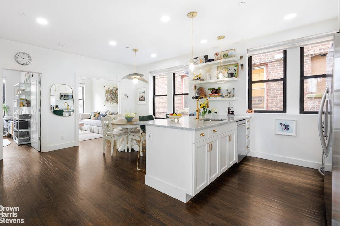 Gorgeous, renovated duplex in a modern, boutique condo building on one of the prettiest Park Slope blocks.
