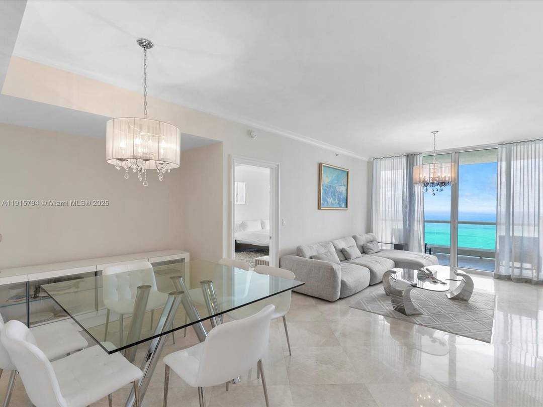 Experience luxury living in this spectacular three bedroom, three bathroom oceanfront residence at Acqualina Resort.