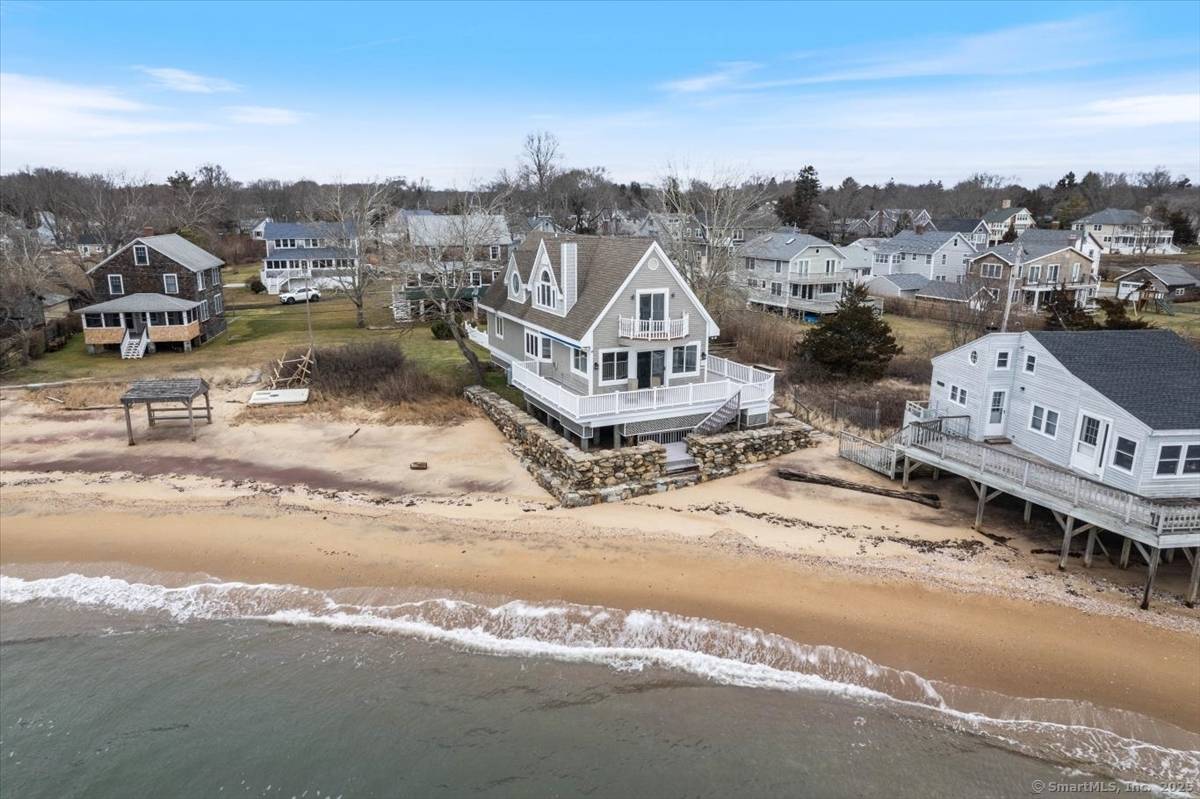 Just Steps from the Sand Your Coastal Retreat Awaits !