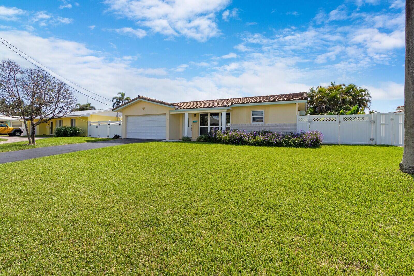 RUN to see this GORGEOUS DESIGNER WATERFRONT HOME on a Cul de Sac in Pompano Beach.