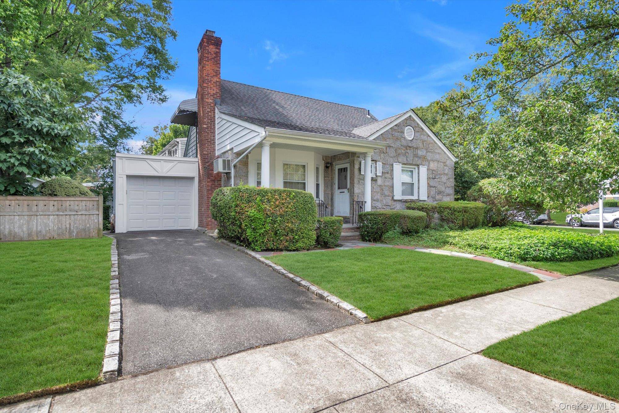 Welcome to this charming home located in the prestigious Oak Section of New Hyde Park.