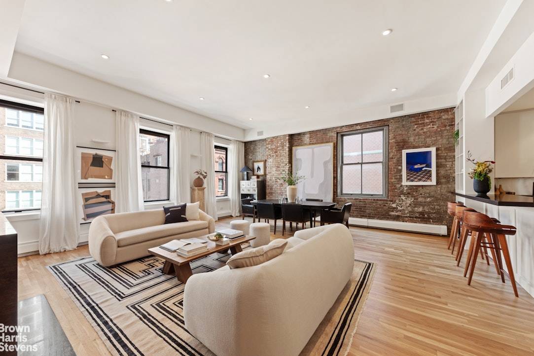 Located on one of the most coveted blocks in historic Tribeca, this rarely available 2 bedroom, 2 bathroom pre war loft is a true gem.