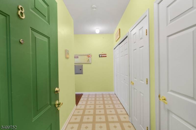 Welcome to this stunning turn key condo offering breathtaking water views of Raritan Bay, the Verrazano Bridge, and the Manhattan skyline.