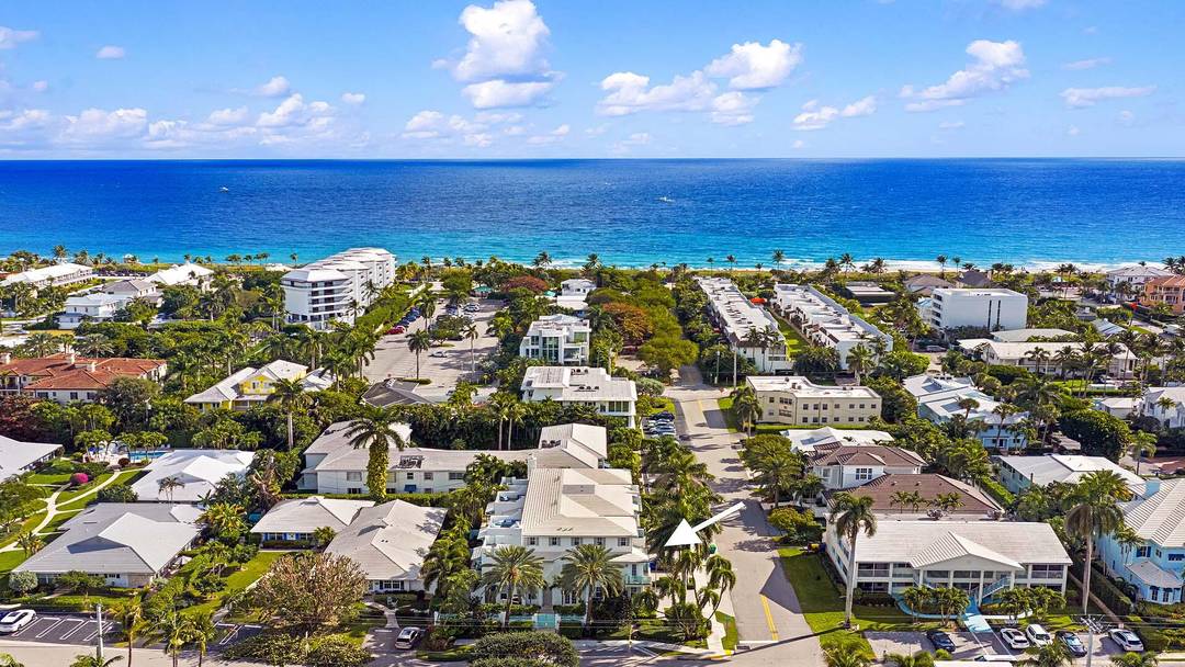 An exceptional coastal townhome, offering refined lock and go living just one block from Atlantic Avenue and one block from the beach.