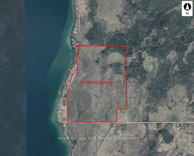 187 acre cash crop or pasture farm adjacent to Green Bay on Lake Manitou, Manitoulin Island.