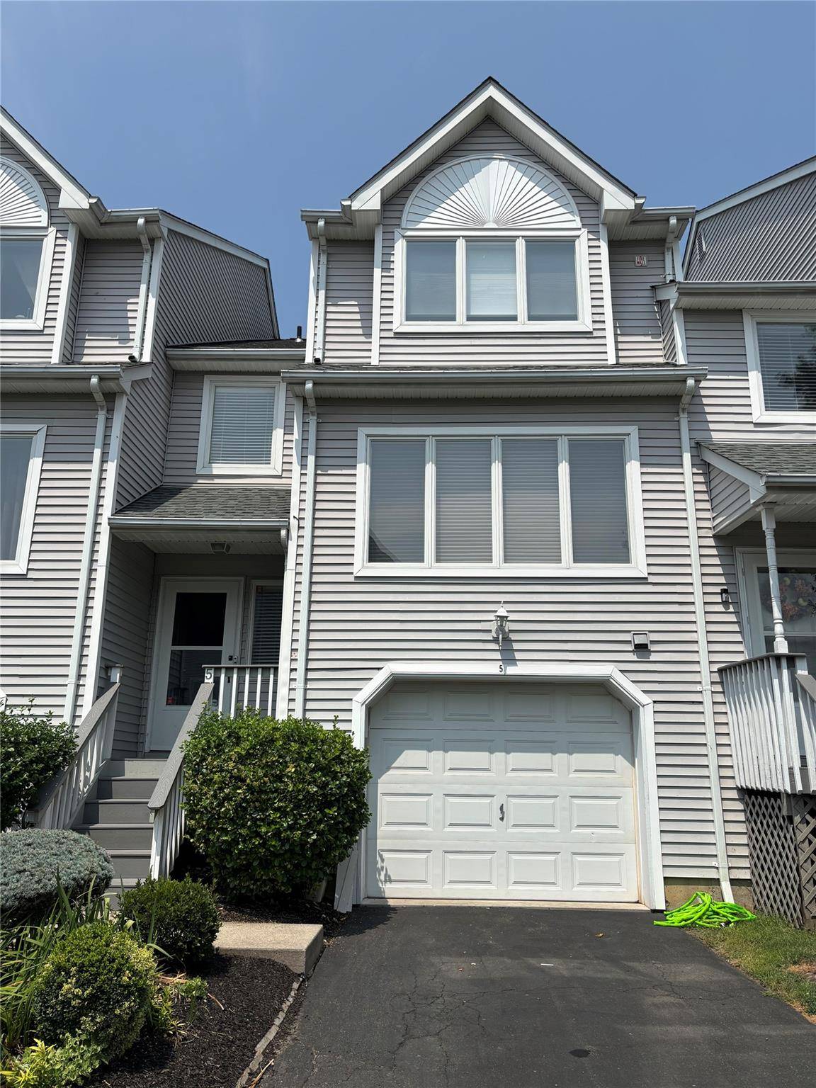 Lovely three level townhouse featuring a well designed floor plan thats offers comfort and functionality on every level.