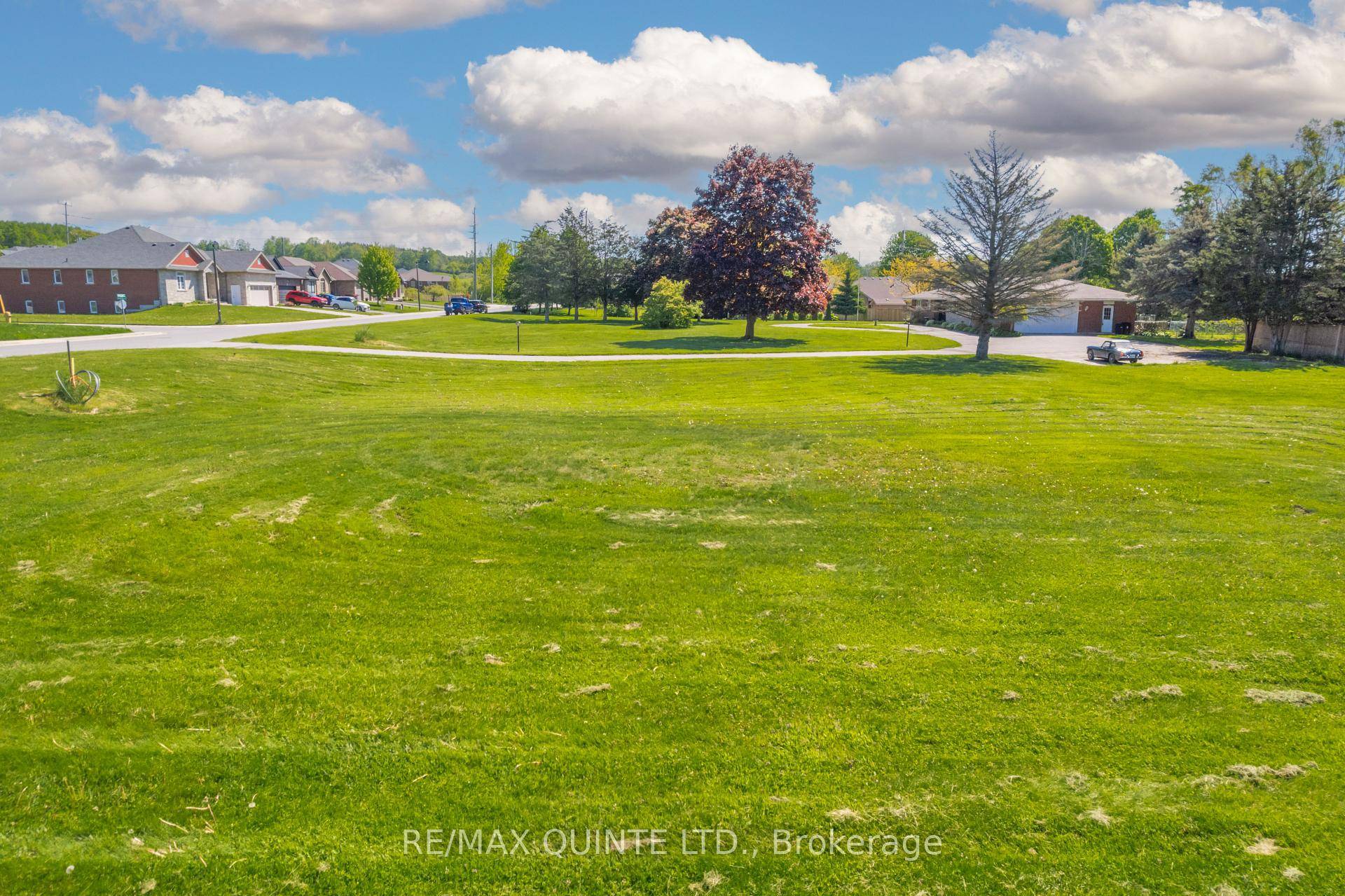 This rare and exceptionally located property consists of almost 2 acres in the heart of the constantly developing Town of Brighton.