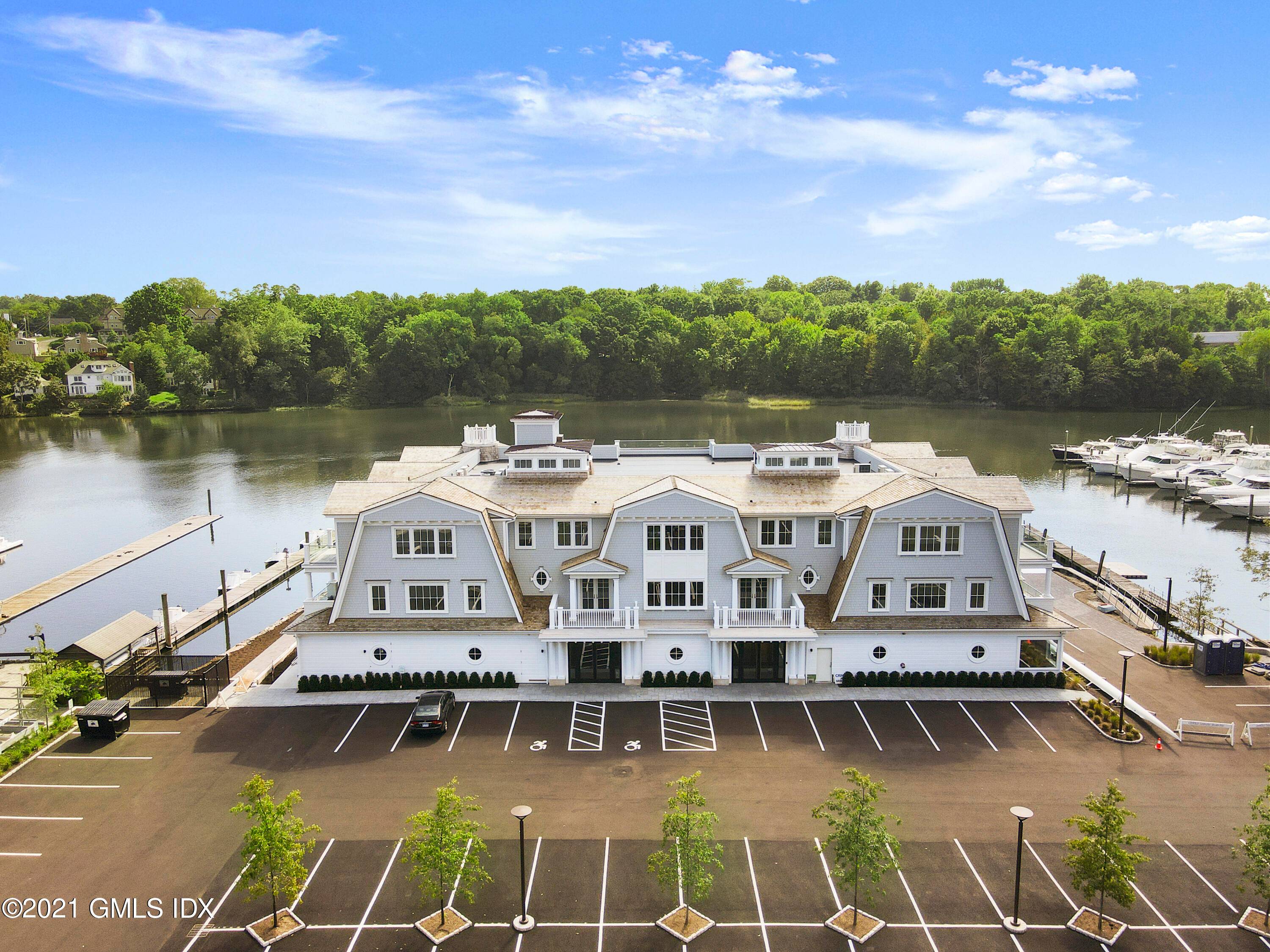 One of a kind direct Waterfront Shingle Style 12 unit condo association just completed and ready for summer occupancy.