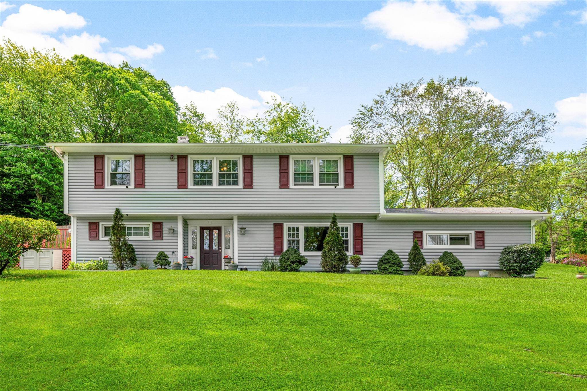 Positioned on a large corner lot within a peaceful tree lined street in Yorktown Heights this appealing split level home is less than five miles from the Taconic State Parkway ...