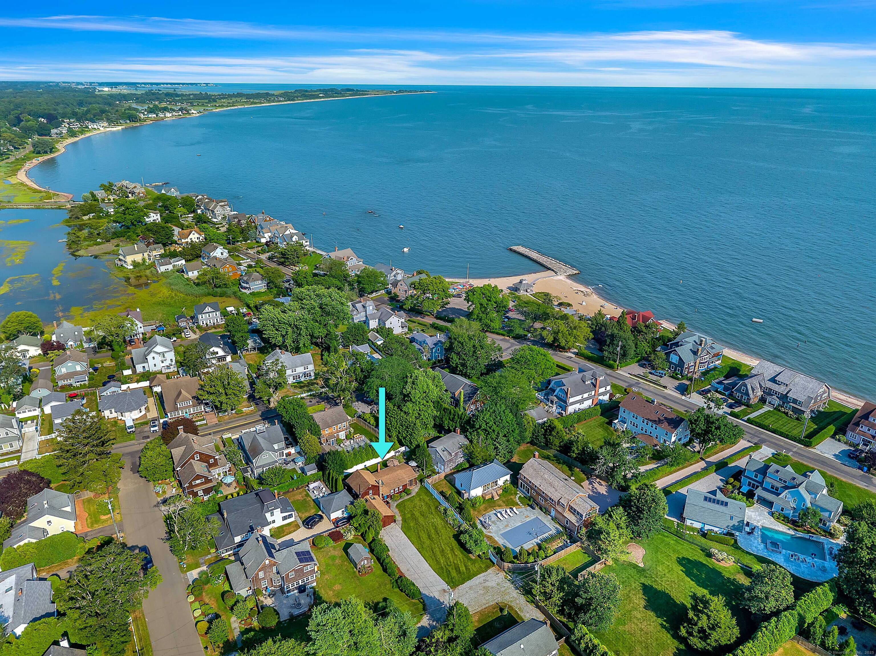 Steps to the Shoreline Four Bedroom Beach Retreat with Deeded Beach Right Away !