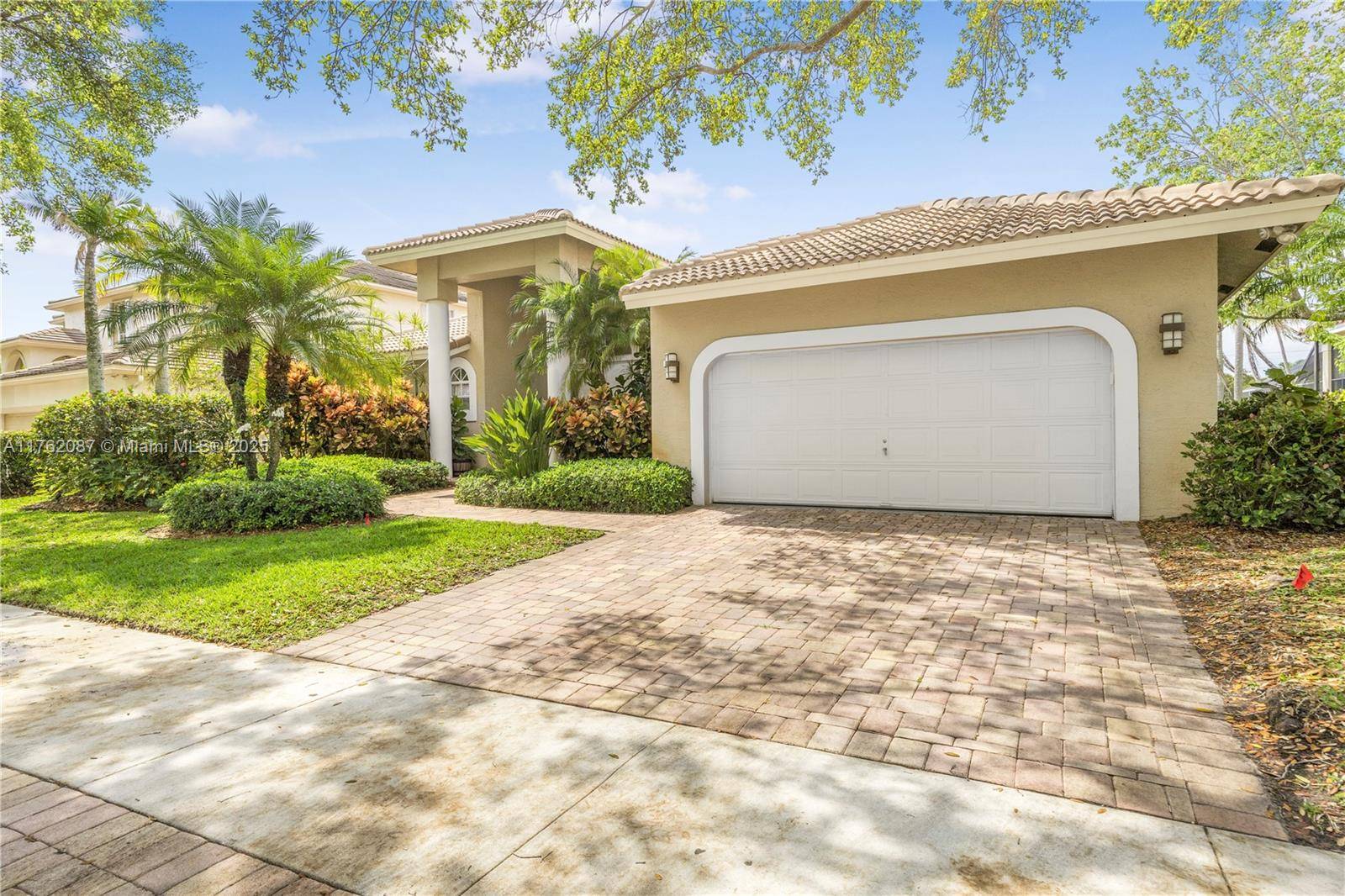 This contemporary chic home boasts a sought after one stoy split floor plan with 4 bedrooms and 3 bathrooms, featuring a remodeled kitchen with custom wood cabinets, granite countertops, and ...