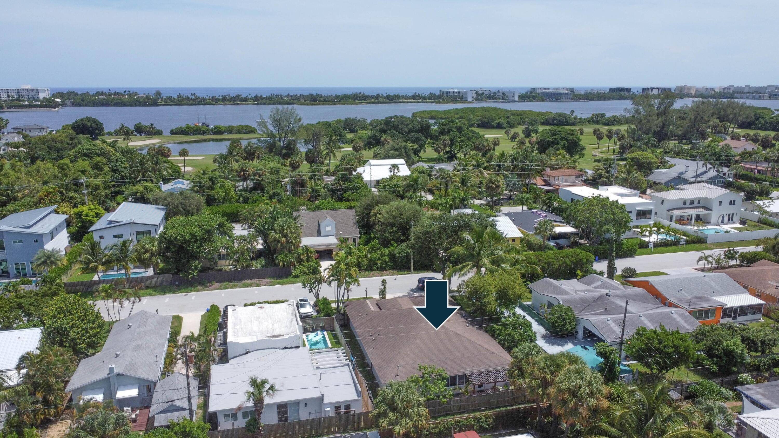 Gorgeous and private coastal home tucked away in one of South Florida's most desirable neighborhoods Lake Worth Beach's Palmway corridor.