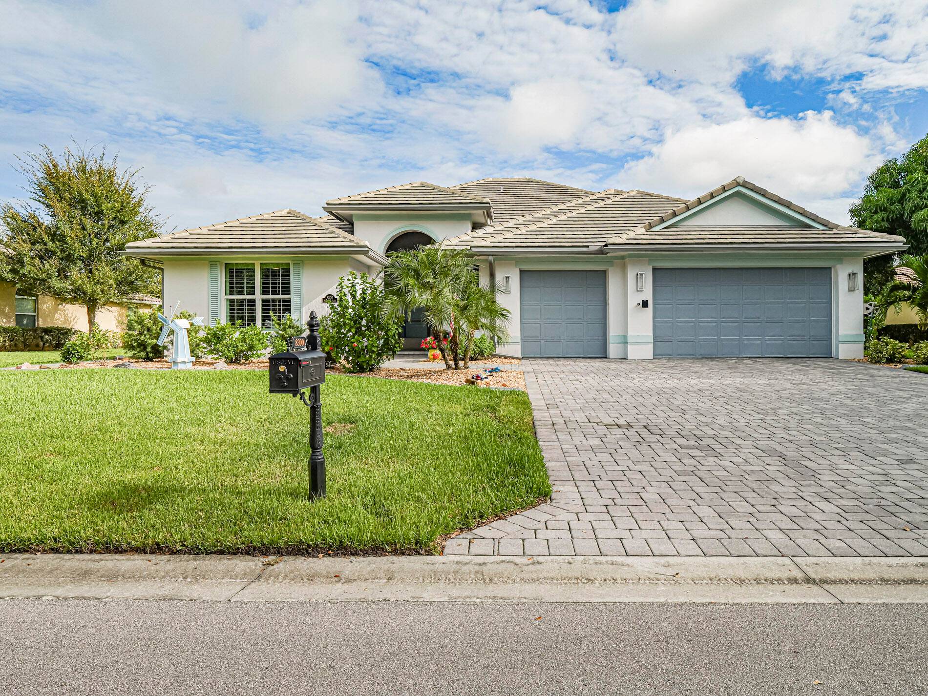 Immaculate GHO home on a serene lakefront lot.