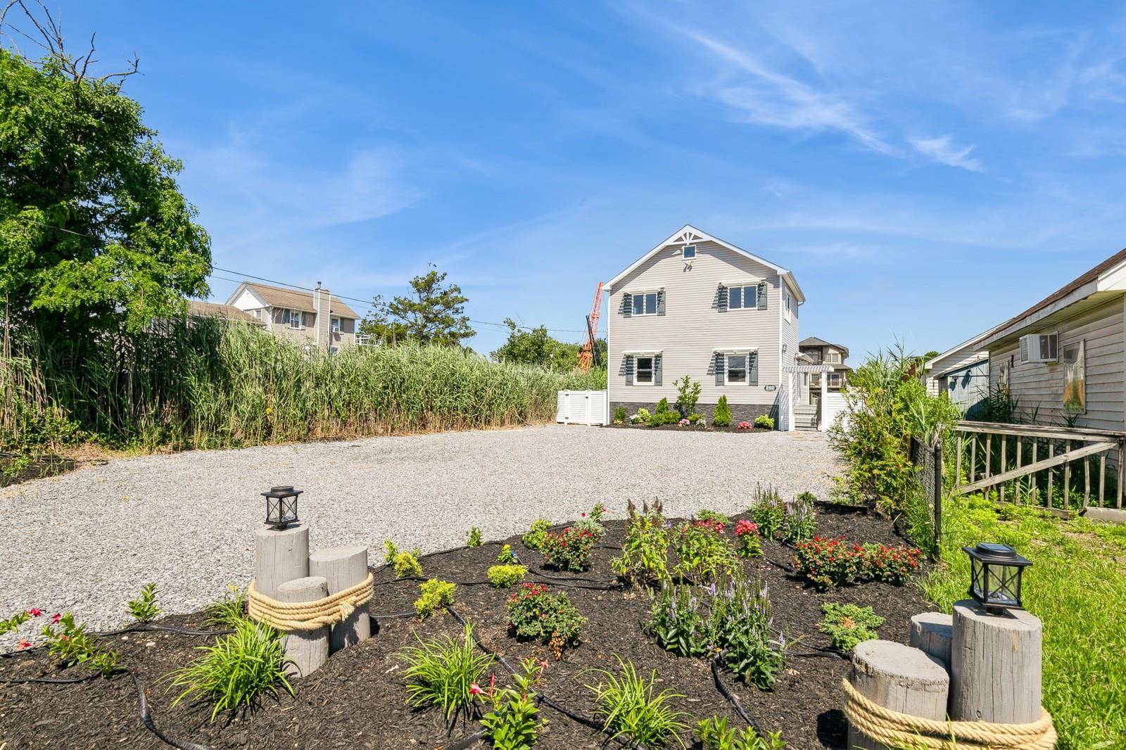 Welcome to this stunning, newly renovated waterfront home in Amityville It is a boating community and, it's a water lover's dream home w 50 ft.