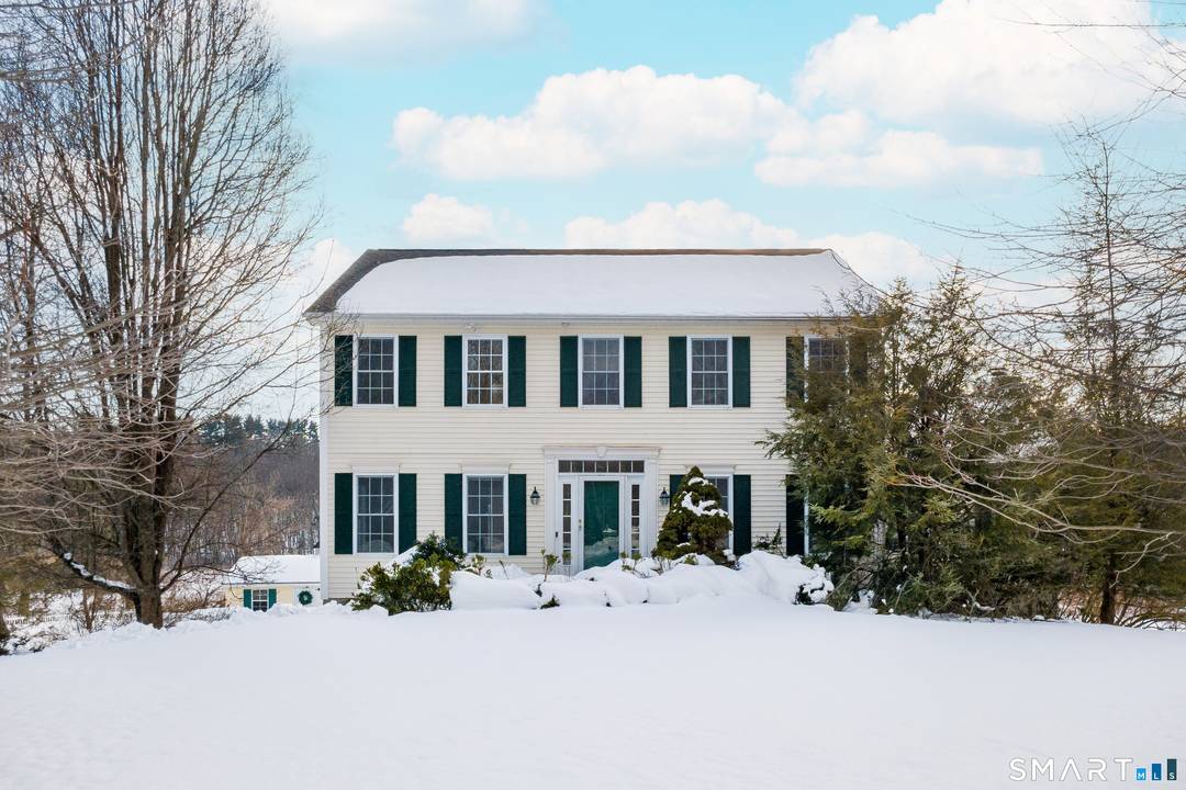 Welcome to 73 Dodgingtown Road, a beautifully maintained 2001 Colonial set on a level lot with wonderful outdoor living.