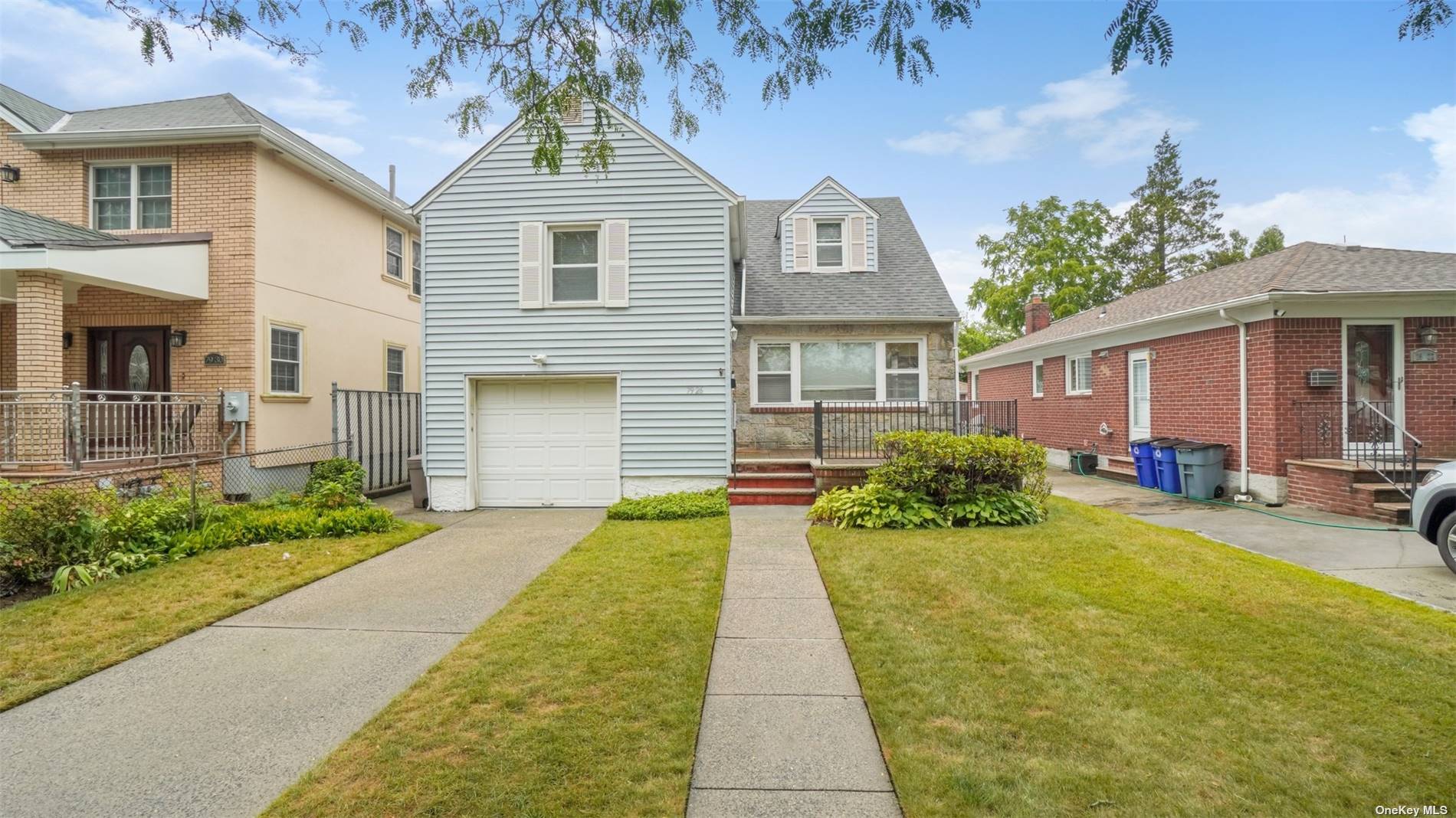 Newly Renovated split level home located with in a block from Union TPKE in Glen Oaks.