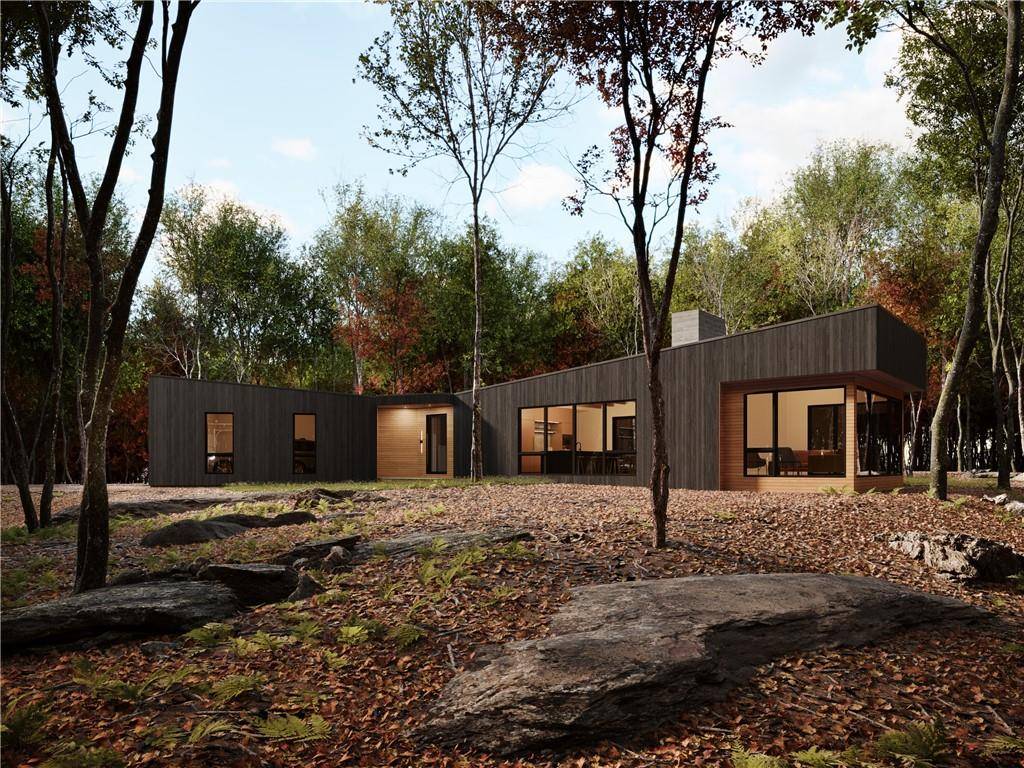 To Be Built Sleek and sophisticated, this modernist residence echoes the subtle ripples of nearby Round Pond, to which Lakeside has lake access rights.