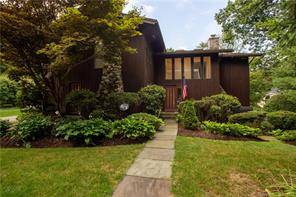 Newly price reduced, this resort like property features a wonderful contemporary home set on peaceful wooded grounds.