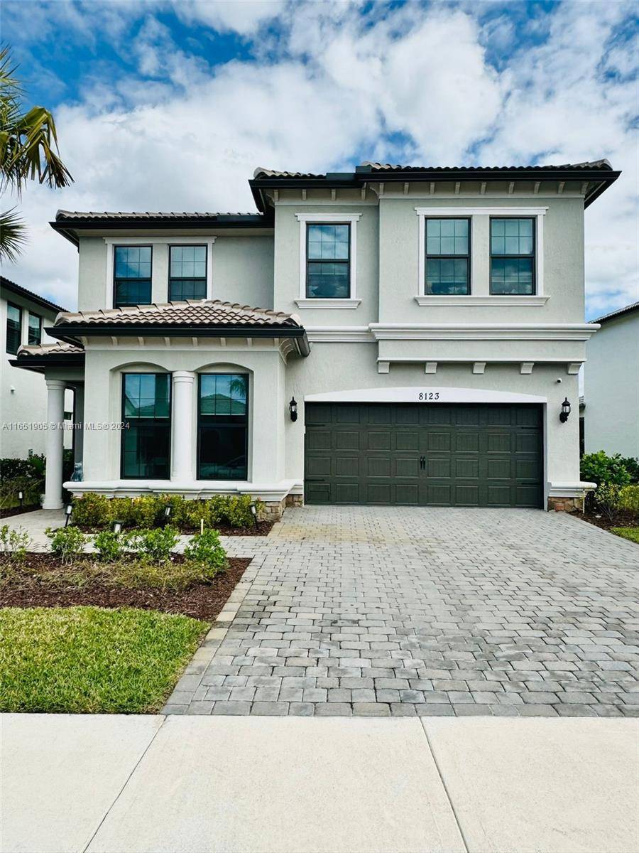 Golfer's dream home ! ! Welcome to The Enclaves at Woodmont, where modern elegance meets spectacular golf course and lakes views.