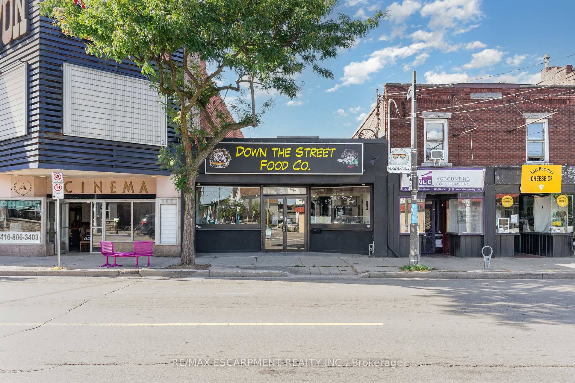 Prime Ottawa St North Building with established long term tenant and vacant bachelor apartment above.