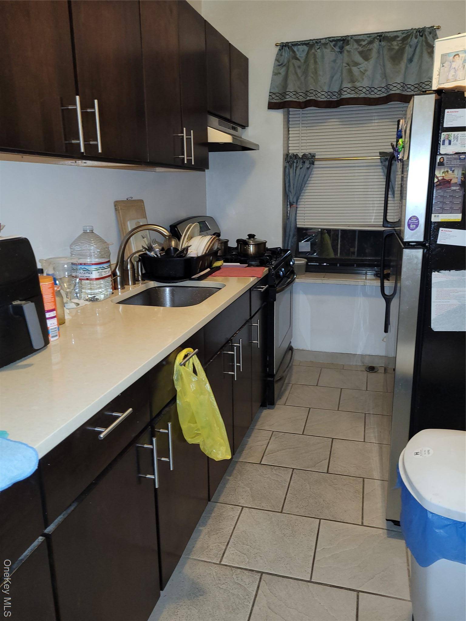 Discover this inviting condo featuring beautiful wood floors throughout, offering a warm and elegant ambiance.