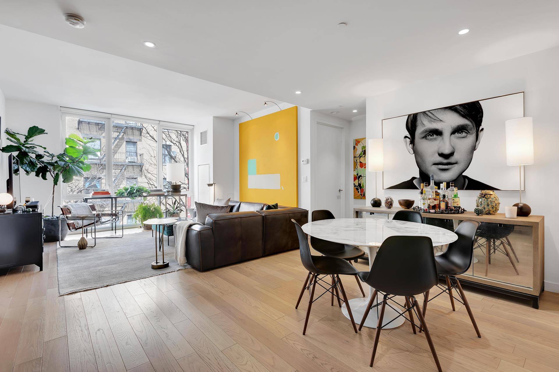 This luxurious 1, 206 square foot 2BR 2BA is situated on a treelined block in this quiet section of western Hells Kitchen.