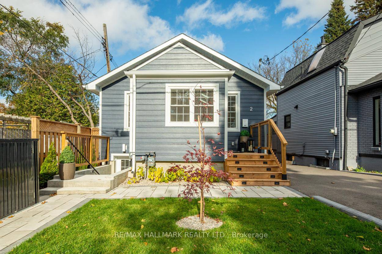 Nestled in the enchanting Birch Cliff Village, this stunning home beautifully blends timeless charm with modern touches.