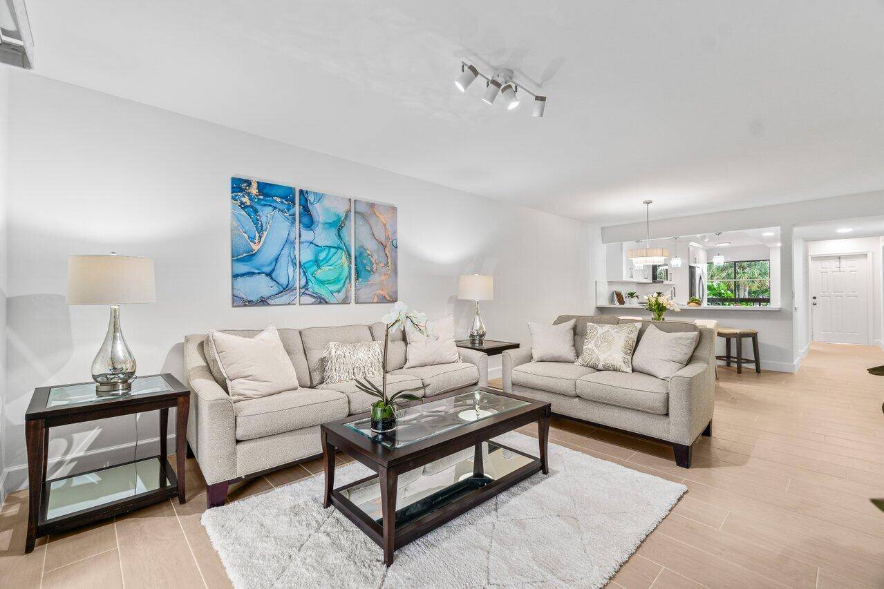 This is the completely remodeled from top to bottom condo in today's modern style w serene lake views that you have been waiting for !