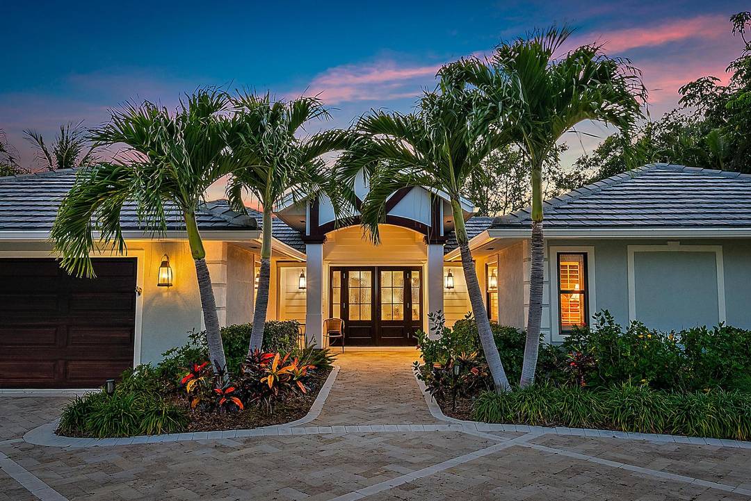 A boater's refuge, this waterfront home offers over 100 feet of deep water frontage with a flexible dock setup, currently configured for a 61ft Viking and two 30 foot sport ...