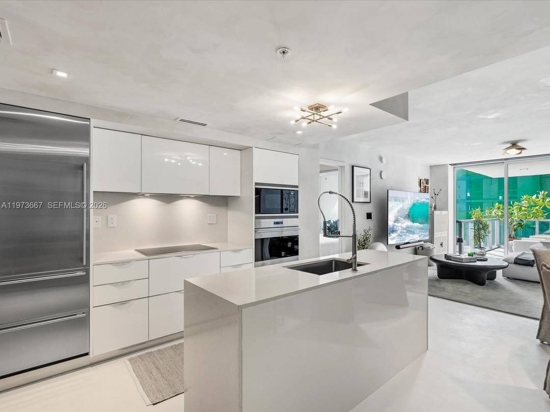 Bijou residence 705 offers a rare opportunity to own a fully customized residence in one of Bay Harbor Islands most exclusive boutique waterfront buildings.