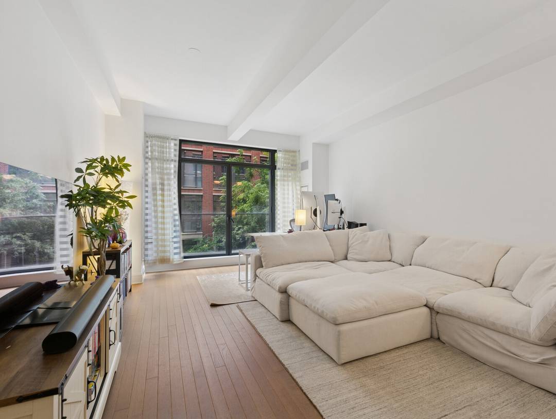 The Greenwich Lane. This gracious 1 BR, 1 Ba residence on West Twelfth Street offers southern exposure over the central garden through newly enlarged, double hung mullioned windows.