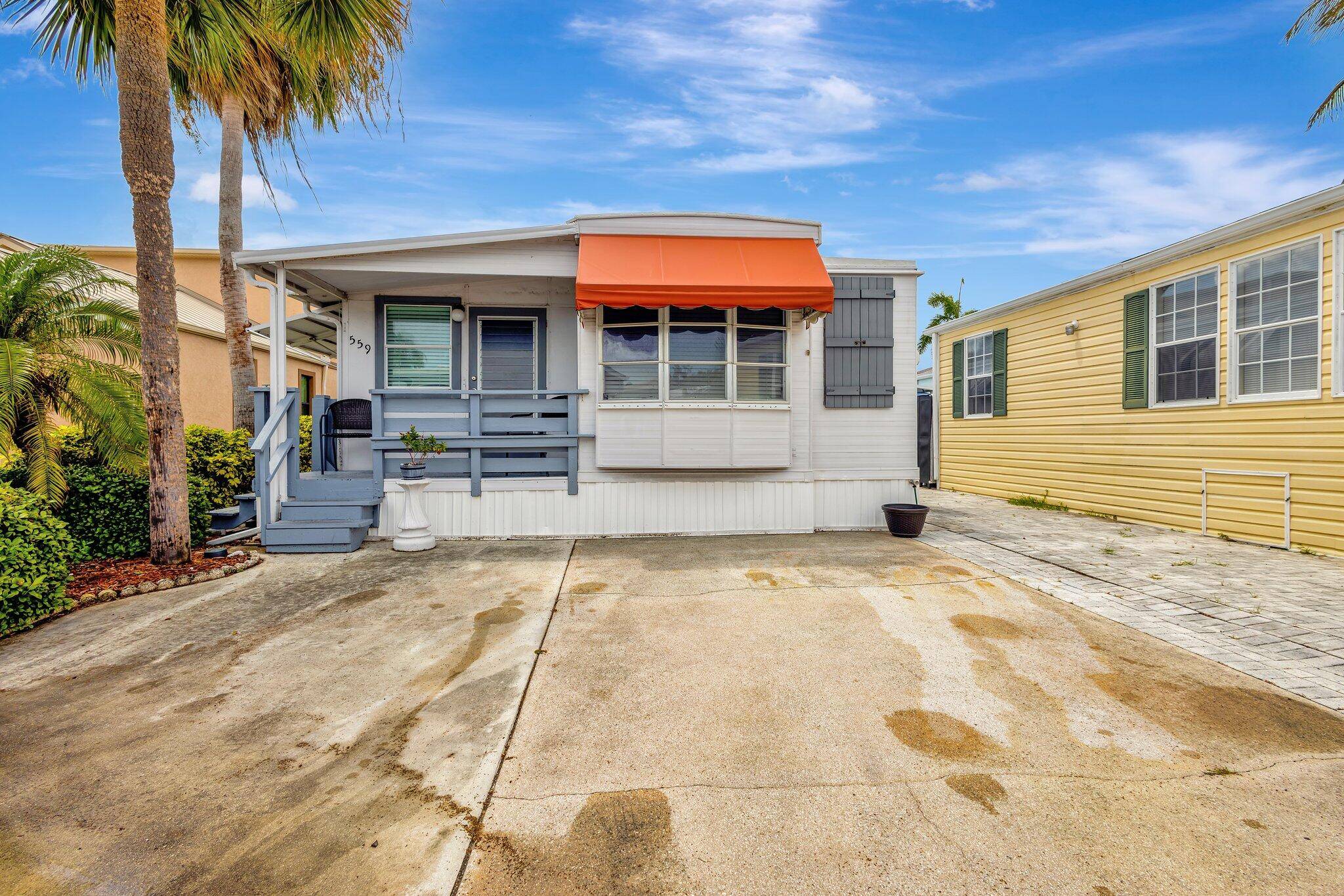 Charming island bungalow located in one of Hutchinson Island's most vibrant, gated communities.