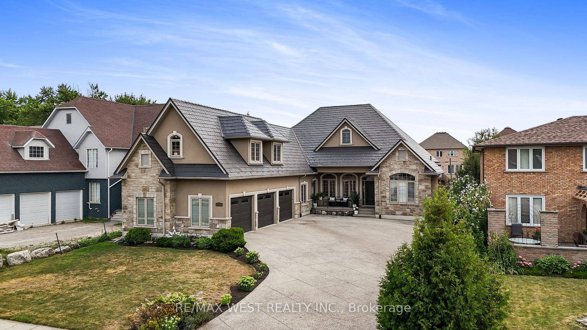 Welcome to this exceptional custom built stone and stucco bungaloft, perfectly situated on a rare 60 x 200 ft fully fenced lot.