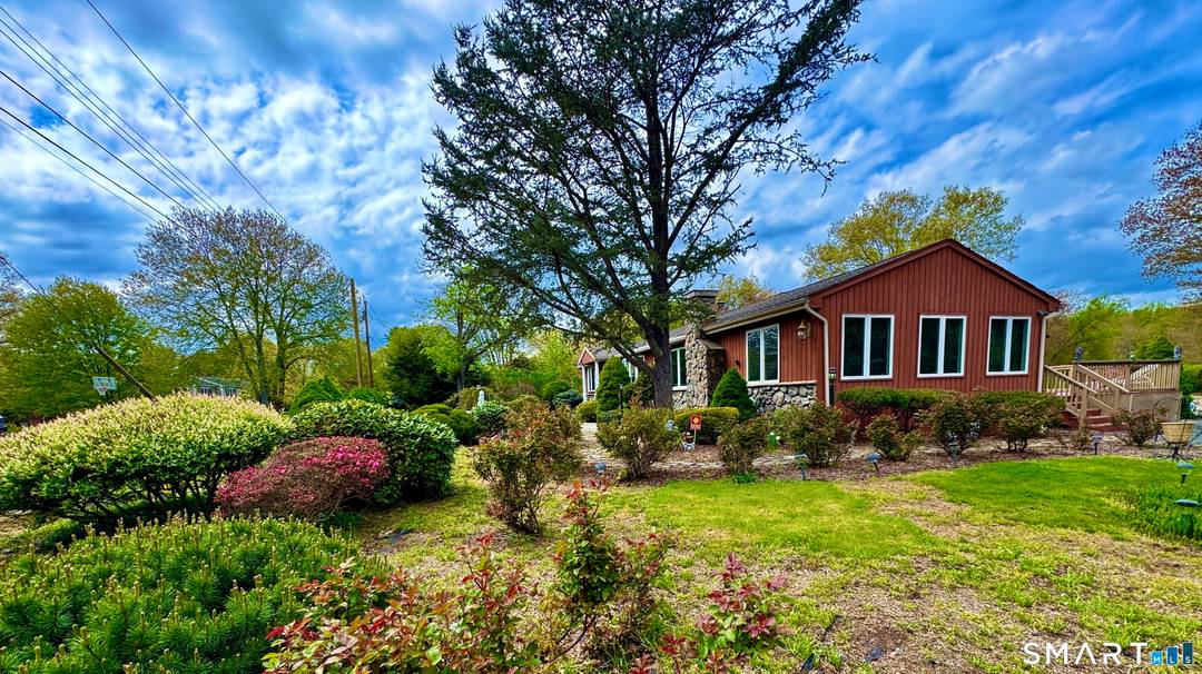 Experience unrivaled luxury in this custom designed, sprawling ranch, perfectly positioned with views of Twin Brooks Park.