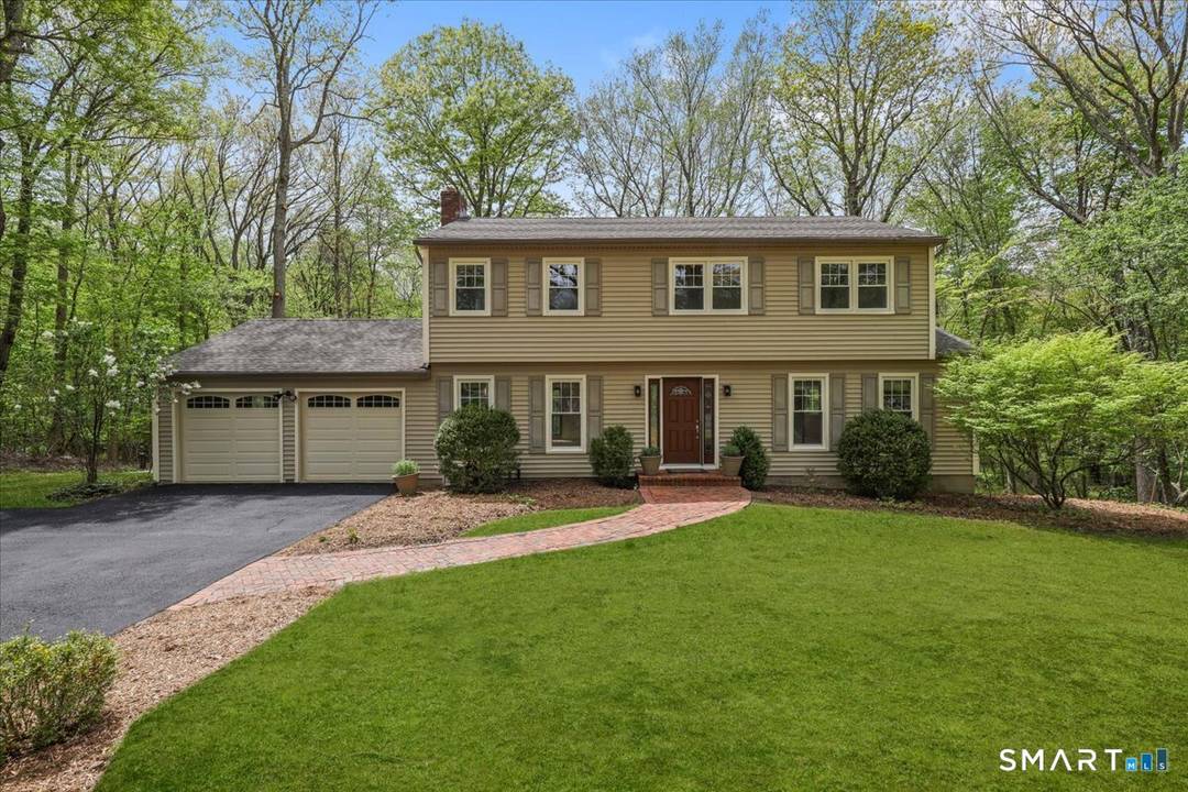 This move in ready colonial offers a functional layout for everyday living and entertaining, in a serene setting.