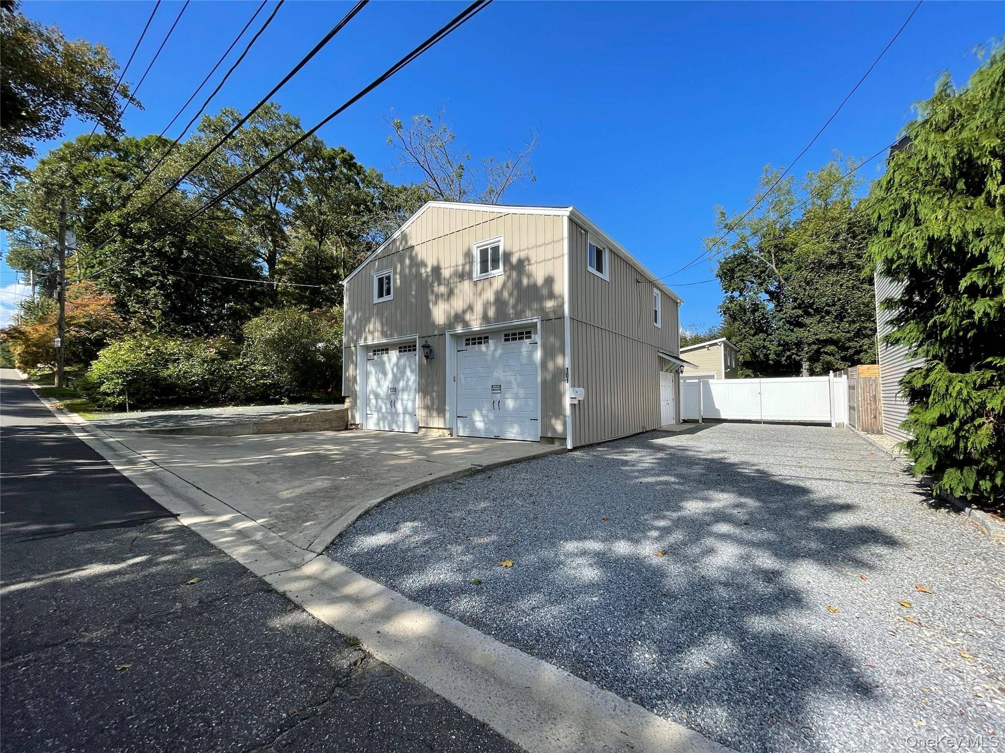 Newly renovated garage with 900 sqft upstairs office space.