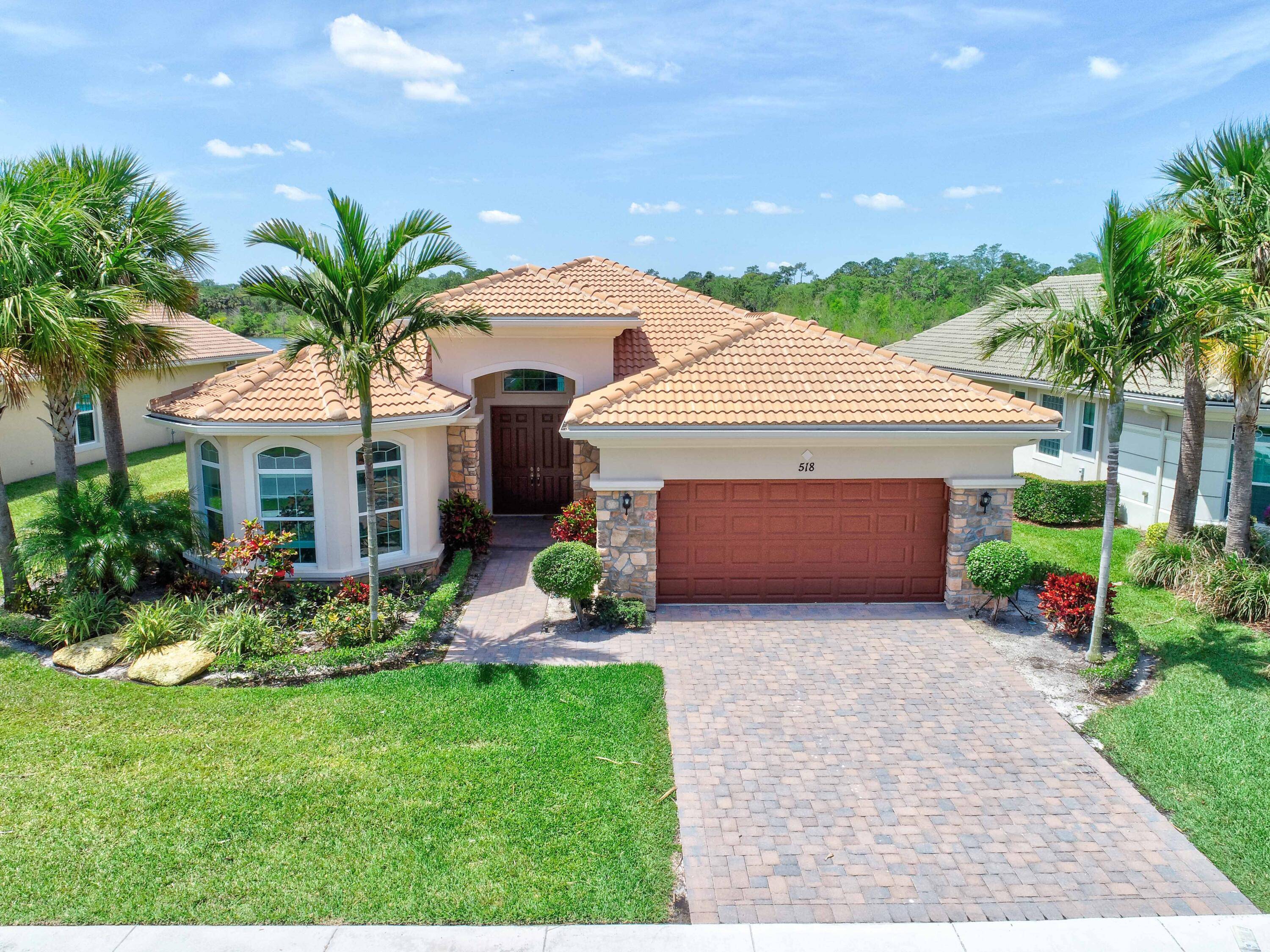 One of last homes to be built in Jupiter Country Club, in 2017 one of the nicest lakefront lots in the community looking at large Preserve and Huge State Park.
