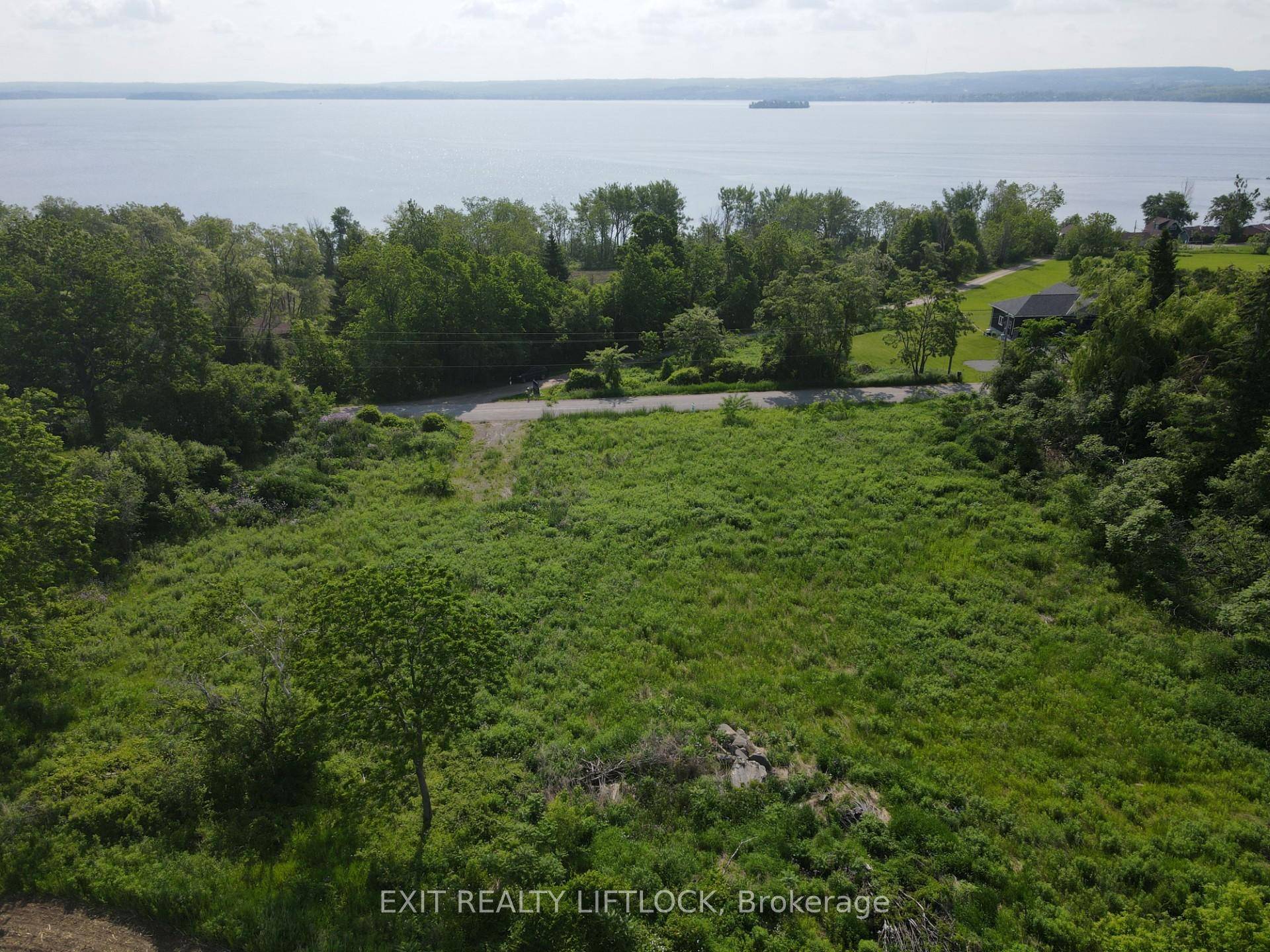 New building lot available on Paudash St with panoramic views of Rice Lake.