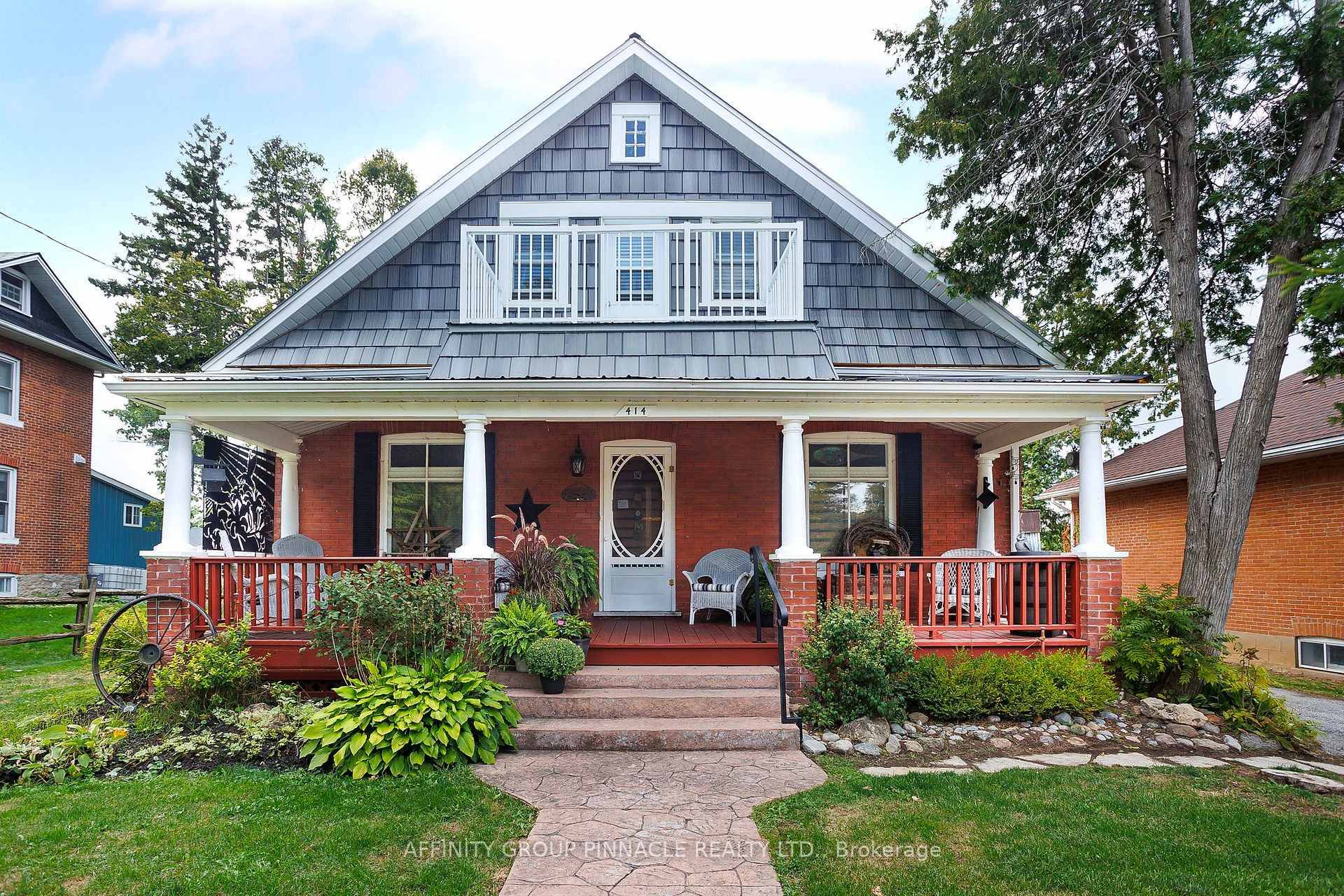 This inviting century home offers three bedrooms and one and a half bathrooms, including a convenient main floor bedroom and a primary suite equipped with a private two piece ensuite.